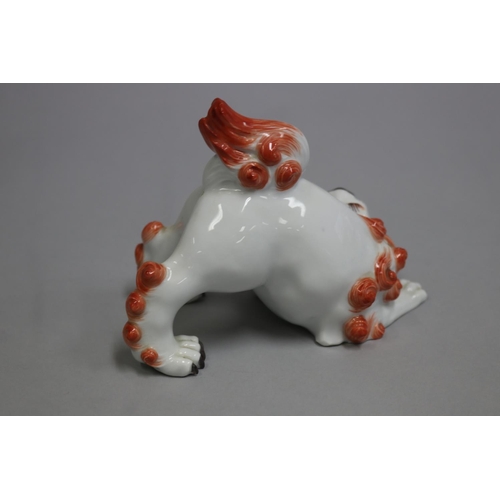 82 - Antique / vintage Meissen porcelain dog, with iron red highlights, circa 1924 mark, approx 12cm H x ... 