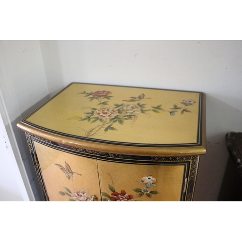 111 - Modern quality gold and black lacquer pedestal cabinet, approx 123cm H x 56cm W x 41cm D