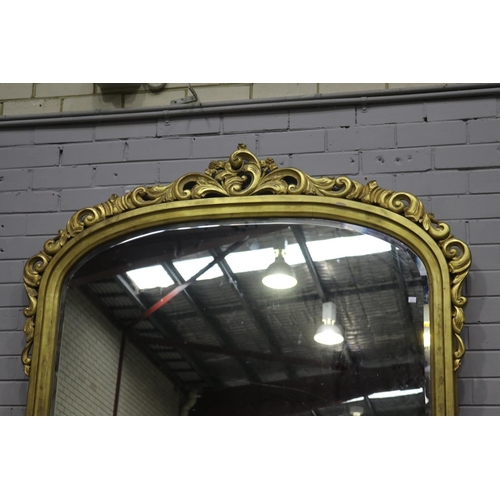 465 - Large Victorian style arched top over mantle mirror with applied scrolling foliage crest, approx 176... 