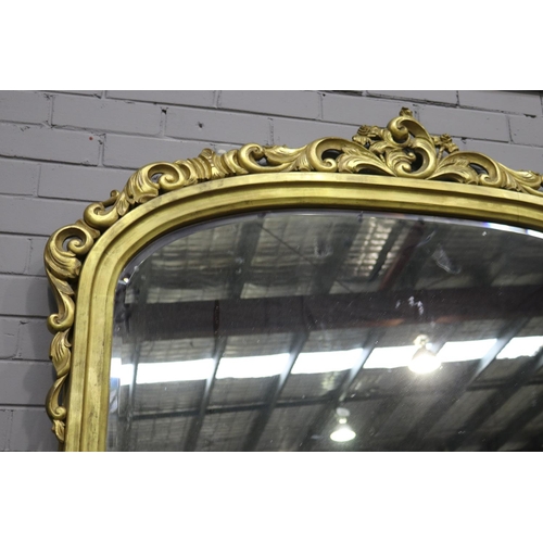 465 - Large Victorian style arched top over mantle mirror with applied scrolling foliage crest, approx 176... 