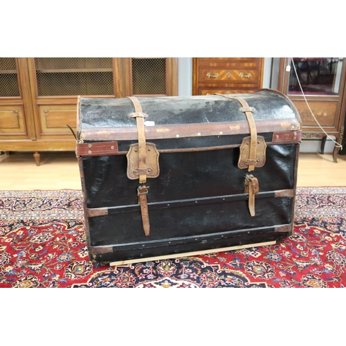 128 - Large antique French travelling trunk, ebonized woven canvas over a woven cane frame, with thick bro... 
