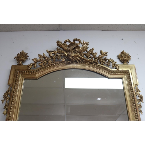 149 - Fine antique French gilt gesso surround salon mirror, with elaborate crest of crossed torch and arro... 