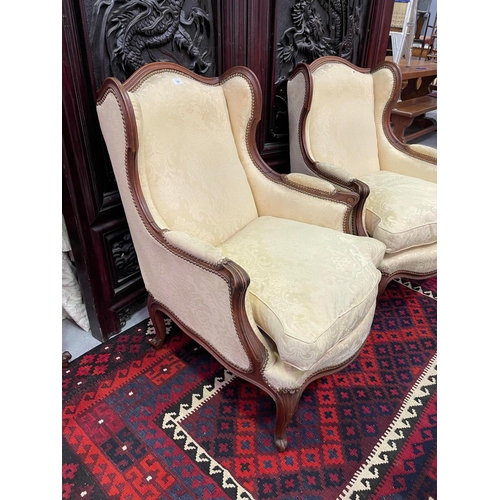 321 - Pair of French Louis XV style wingback armchairs (2)