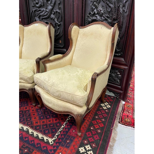 321 - Pair of French Louis XV style wingback armchairs (2)