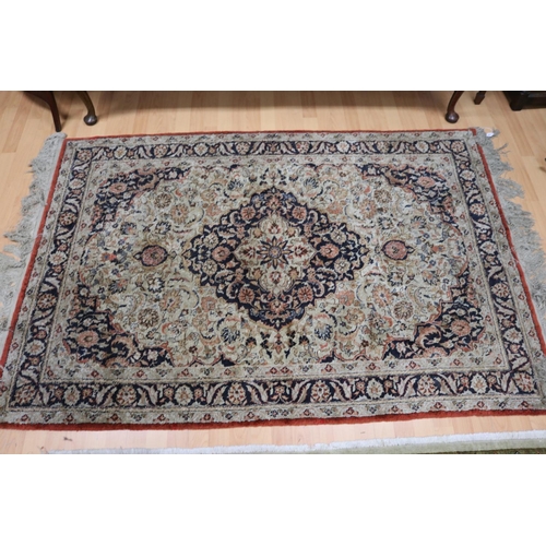 142 - Cream with red and blue ground carpet, approx 189cm x 123cm