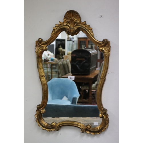 218 - Modern antique style waisted shape mirror, approx 73cm H x 45cm W