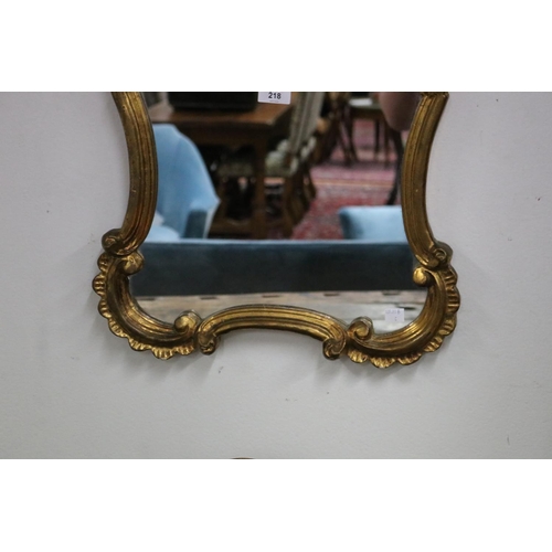 218 - Modern antique style waisted shape mirror, approx 73cm H x 45cm W