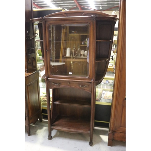 77 - Antique French Art Nouveau carved walnut cabinet, open shelf base, with single long drawer below a c... 