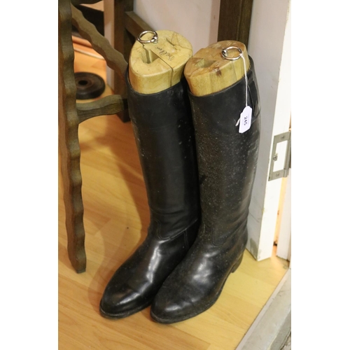 245 - Pair of antique French leather riding boots with wooden stretchers, each approx 50cm H (2)
