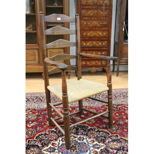 355 - Antique English early 19th century ladder back country arm chair with rush seat