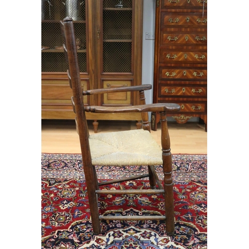 355 - Antique English early 19th century ladder back country arm chair with rush seat