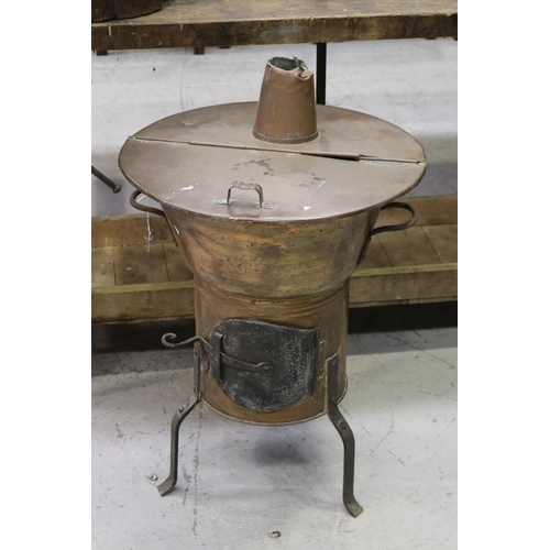 262 - Antique French copper heater on wrought iron legs, approx 79cm H x 51cm Dia