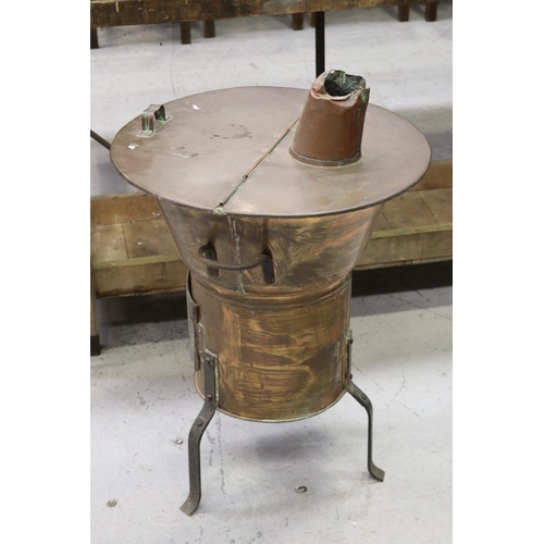 262 - Antique French copper heater on wrought iron legs, approx 79cm H x 51cm Dia