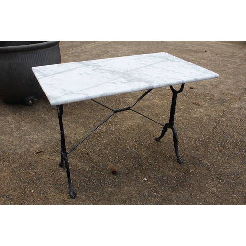 298 - French marble topped bistro table with iron frame, approx 71cm H x 100cm W x 60cm D