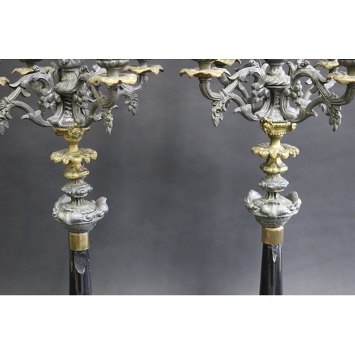 110 - Pair of antique spelter and brass five stick candelabra, each approx 57cm H (ex candles) (2)