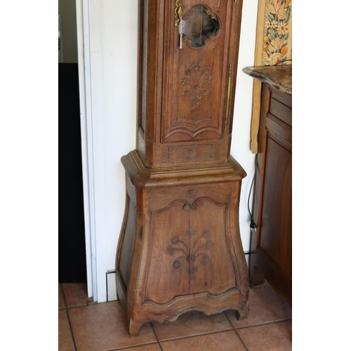 237 - Antique French Louis XV style bombe longcase clock carved in low relief, with movement, has key (in ... 