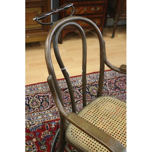 358 - Antique invalids armchair, on three wheels, bentwood with cane seat