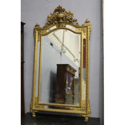 523 - Antique French gilt surround salon mirror, with elaborate urn crest, approx 176cm H x 98cm W
