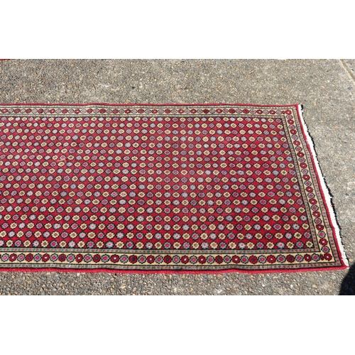 530 - Persian Turkman wool carpet, approx 99cm x 192cm