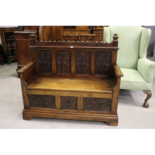 511 - Antique French Gothic revival hall bench with lift up seat revealing compartment, well carved back, ... 