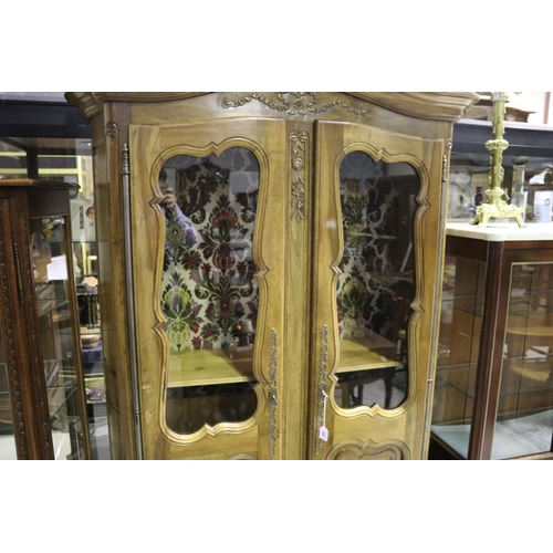 486 - Modern French Louis XV style two door bookcase, with carved palled doors below, approx 193cm H x 125... 