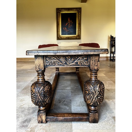 1132 - Impressive Period revival large carved oak baluster leg refectory table. Constructed with old elemen... 