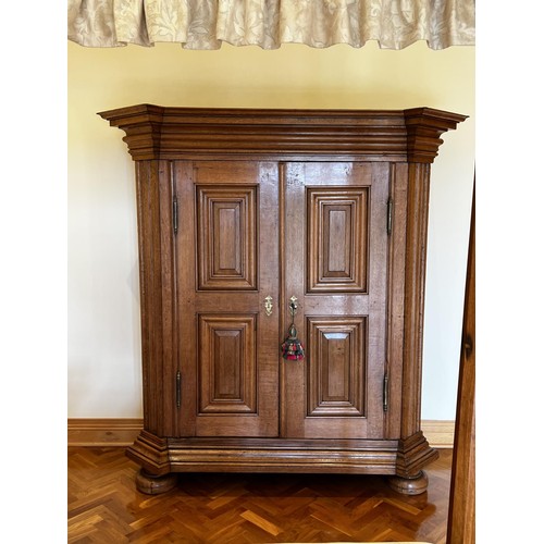 1147 - Antique European oak two door armoire, recessed panelled two doors, flanked by fluted canted sides. ... 