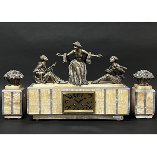 1090 - French Art Deco figural Mantle clock and garnitures with key and pendulum (running at time of inspec... 