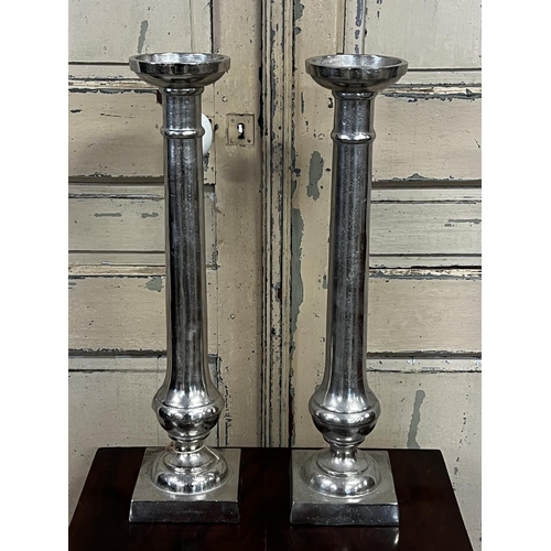 1103 - Pair of tall modern metal candlesticks, approx 59.5cm H (2)