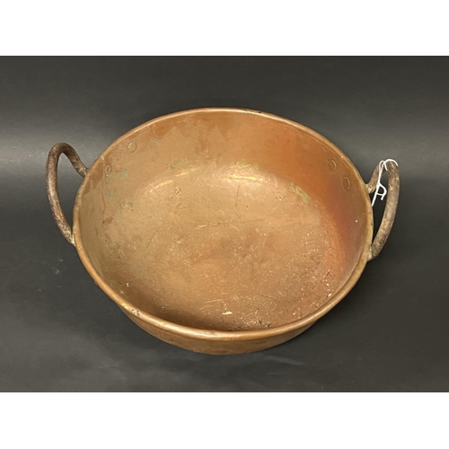 1110 - Antique French copper and iron handled mixing bowl, approx 38.5cm W