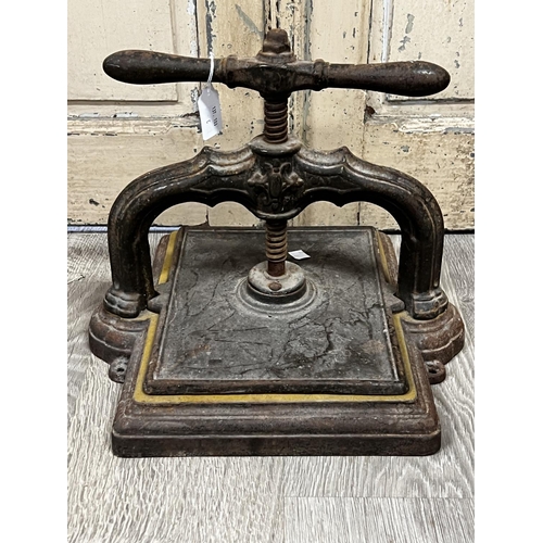 1111 - Antique ornate French cast iron book press, approx 30cm H x 40cm W x 33cm D
