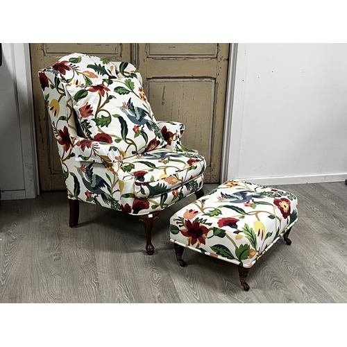 1119 - Moran wing lounge arm chair floral upholstery along with a turned leg foot stool