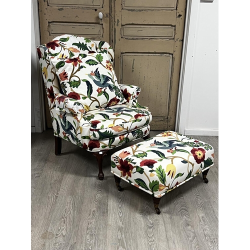 1119 - Moran wing lounge arm chair floral upholstery along with a turned leg foot stool