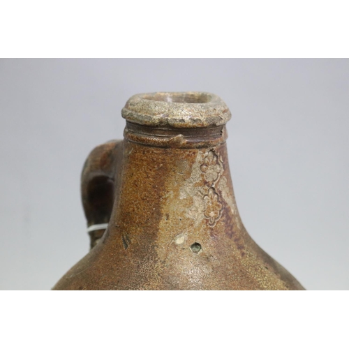 1298 - Antique 17th century Bellermine pottery jug with a floral decoration, approx 34cm H
Circa 1670's