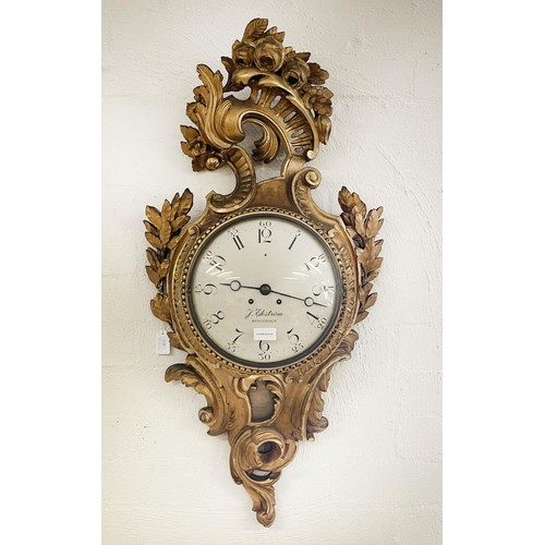 1011 - A Swedish rococo carved gilt wood cartel clock, the 10 in painted convex dial inscribed 'J Ekstrom, ... 