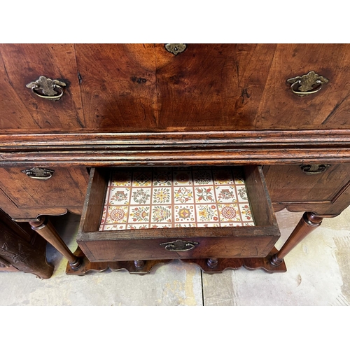1321 - Antique 17th century William & Mary figured walnut chest on stand. Oak lined interior, double feathe... 