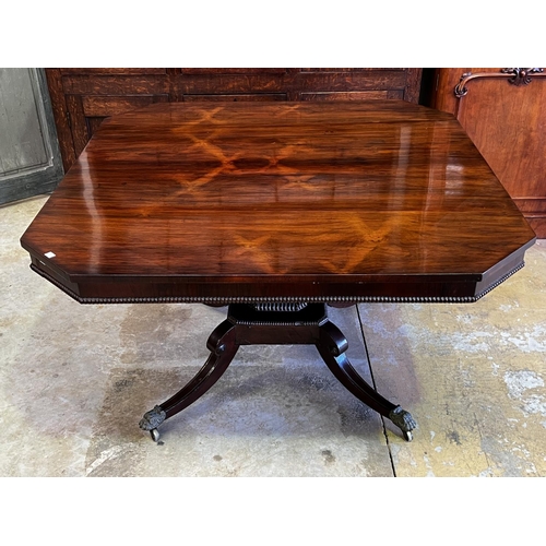 1331 - Fine Antique Regency rosewood & mahogany dining table, snap top with cantered corner, applied beaded... 