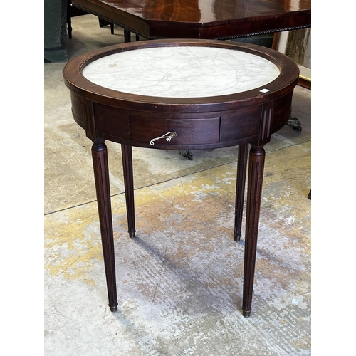 1355 - Antique French marble inset topped briolette table in the Louis XVI style, turned fluted legs. Fitte... 
