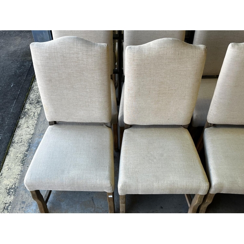 1356 - Set of eight French style high back dining chairs, studded linen upholstery, shaped period style leg... 