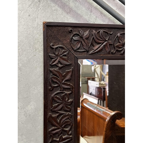 1333 - Antique carved surround bevelled edge mirror, 73cm H x 73cm W