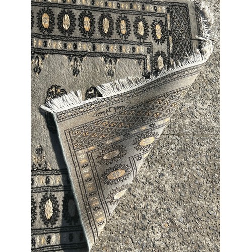 1122 - Silk and wool hand knotted runner, of grey silver ground, approx 290cm x 82cm