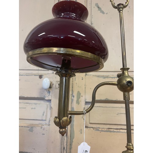 1379 - Antique students brass desk lamp, with deep red glass shade, approx 52cm H