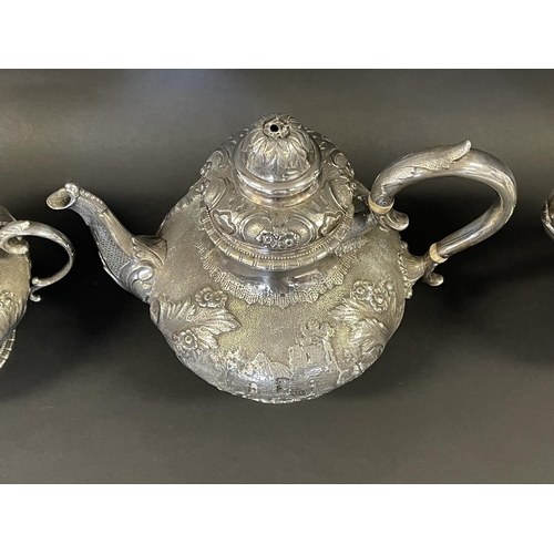 1391 - Antique sterling silver four piece tea & coffee service, each of baluster shape, and repousse worked... 