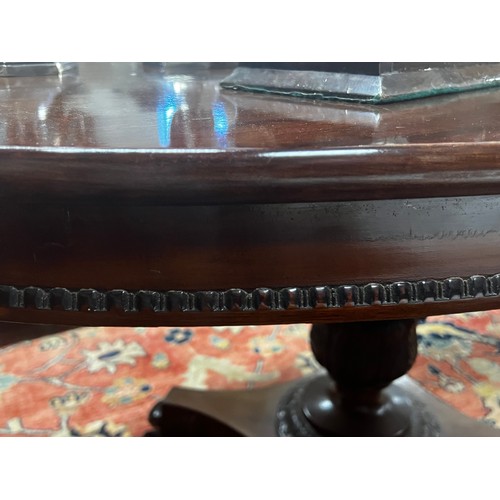 1377 - Antique oval table, single baluster support, on a quatrefoil base with lions paw feet, approx 73cm H... 