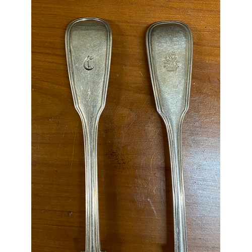 55 - Two antique Victorian hallmarked sterling silver fiddle and thread soup/serving spoons, one crest an... 
