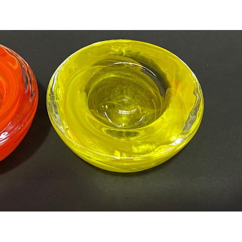 12 - Two Kosta Boda Votives, one orange and the other yellow, approx 7cm H (2)