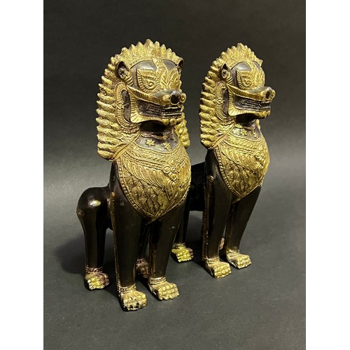 27 - Pair of Thai temple dogs, approx 27cm H (2)