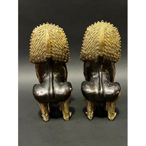 27 - Pair of Thai temple dogs, approx 27cm H (2)