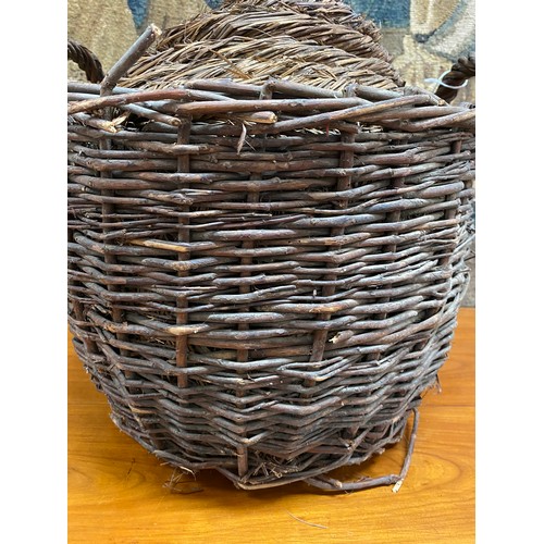 200 - Glass bon bon in wicket basket, approx 43cm H