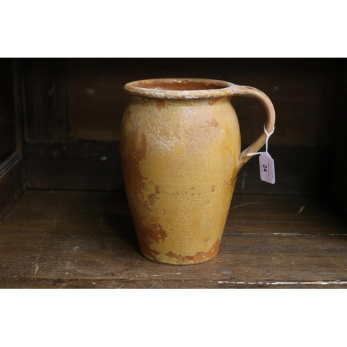 24 - French glazed pottery jug, approx 24cm H